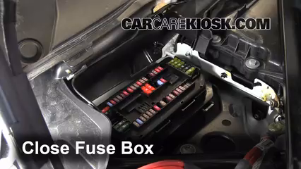 Replace a Fuse: 2012-2016 BMW 320i - 2014 BMW 320i 2.0L 4 Cyl. Turbo